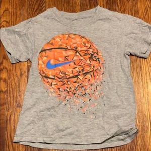 Nike basketball t-shirt size 5. Gently used